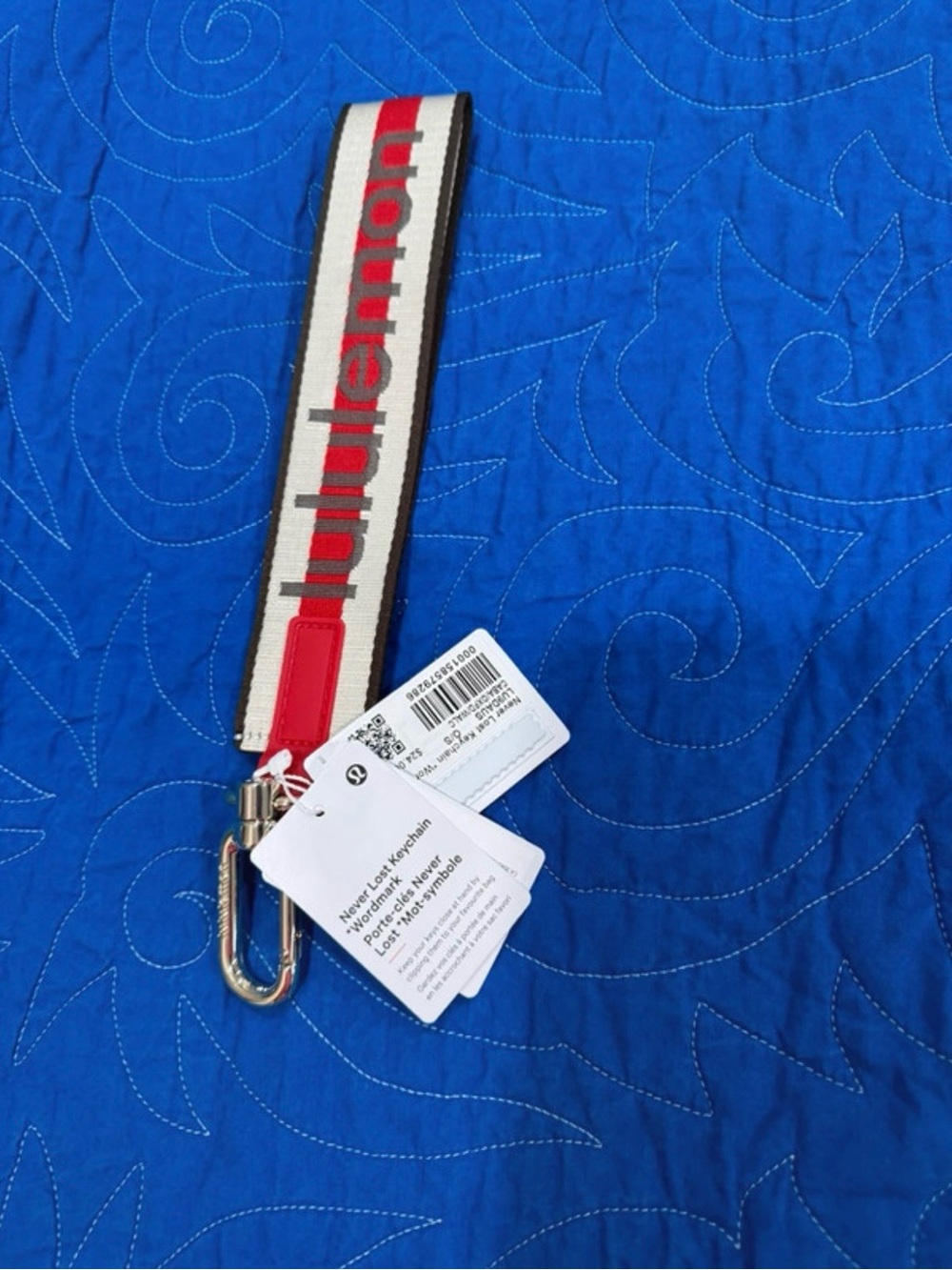 lululemon athletica Never Lost Keychain in Red, White with Grey Logo